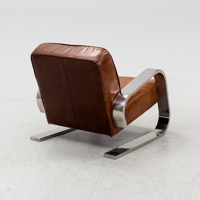 A contemporary easy chair.