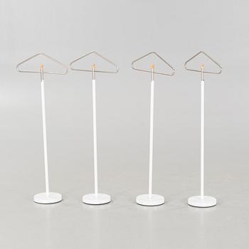 Four coat-hangers from the second half of the 20th century.