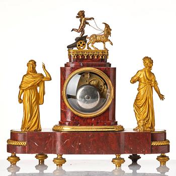 A French Empire 19th century gilt bronze mantel clock signed Lamiral.