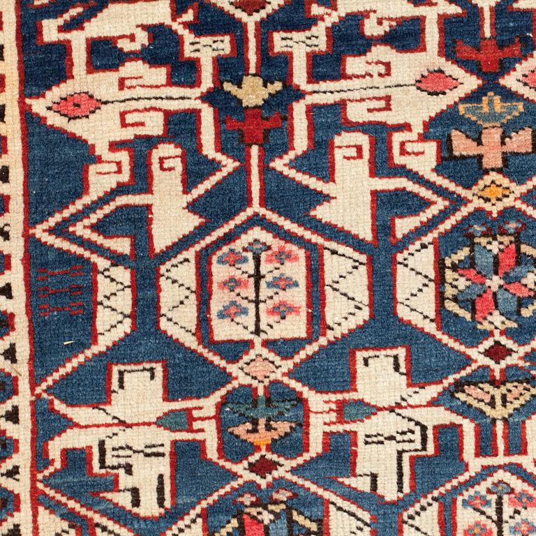 An antique Caucasian carpet, 261 x 140 cm.