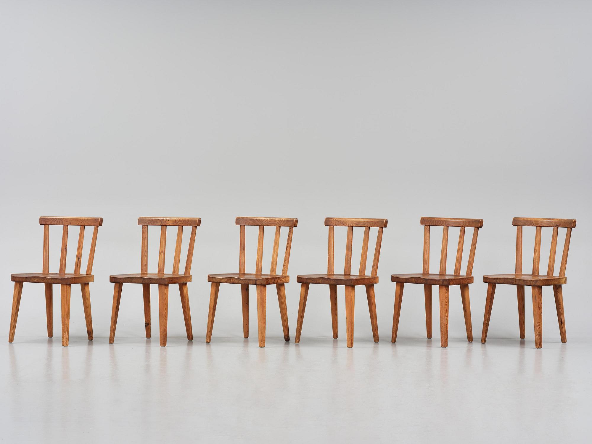 Axel Einar Hjorth, a set of six stained pine "Utö" chairs, Nordiska Kompaniet, Sweden, 1930s.