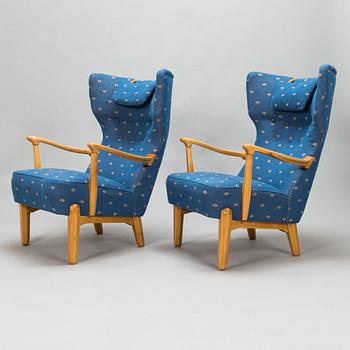 Lasse Ollinkari, a pair of 1947 designed armchairs manufactured by Vallilan Puuseppä Ltd.