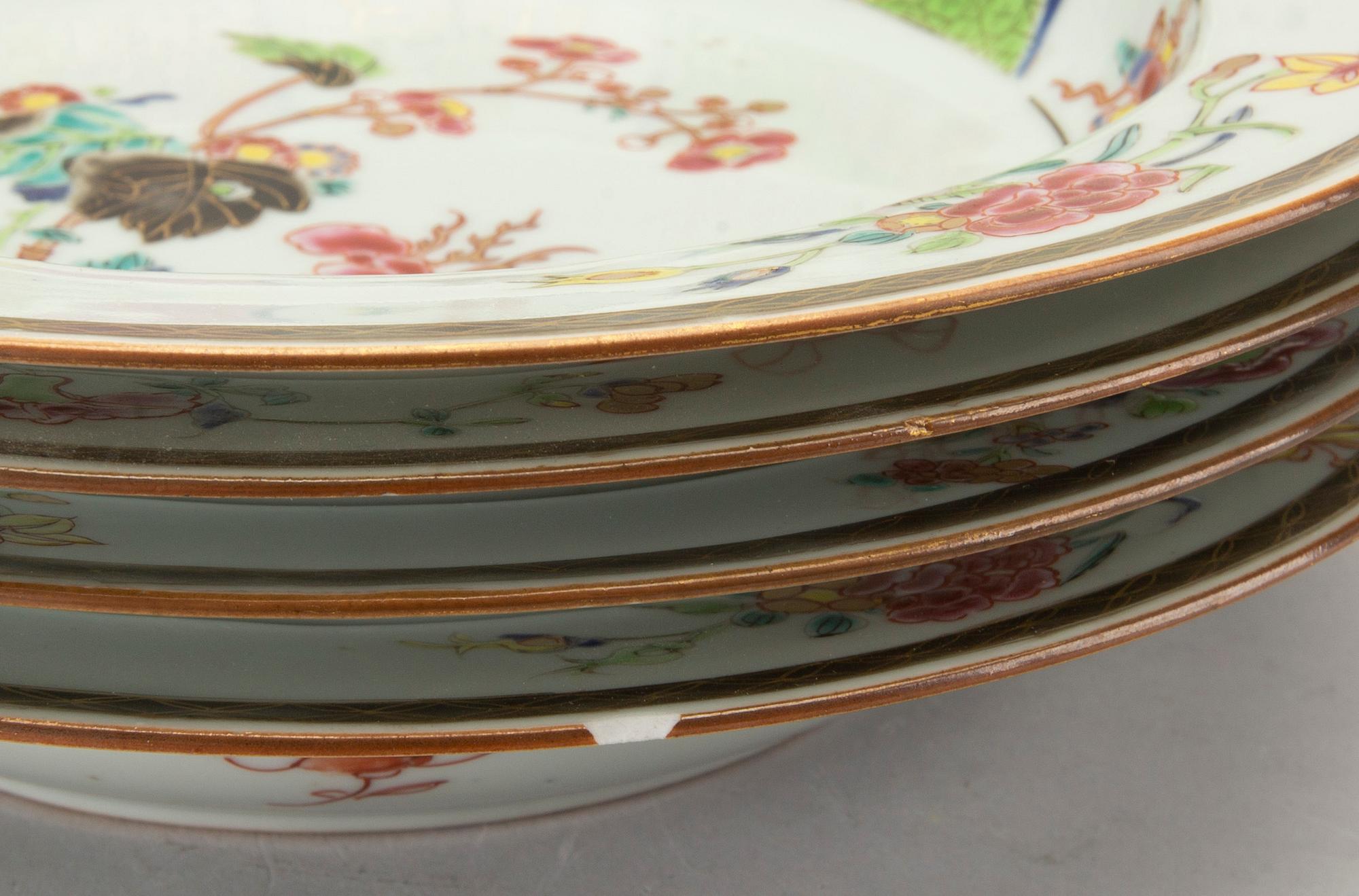 A set of four Chinese famille rose Qianlong porcelain plates.