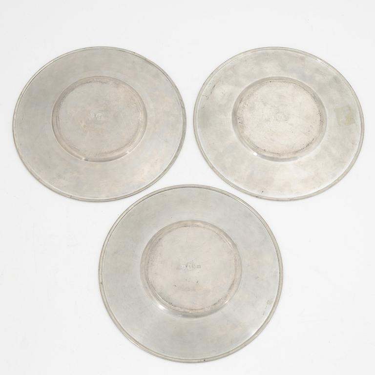 A group of 10 pewter coasters and 3 dishes, Firma Svenskt Tenn, 1948 and 1946.