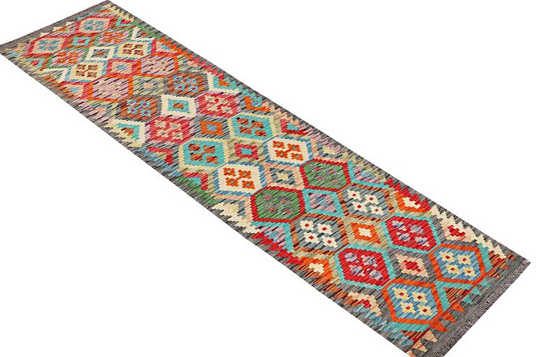 A runner carpet, Kilim, c. 297 x 79 cm.