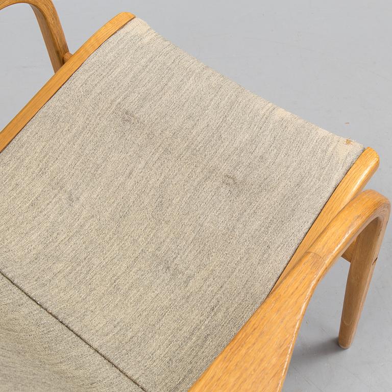 YNGVE EKSTRÖM, an oak 'Laminett' armchair from Swedese.