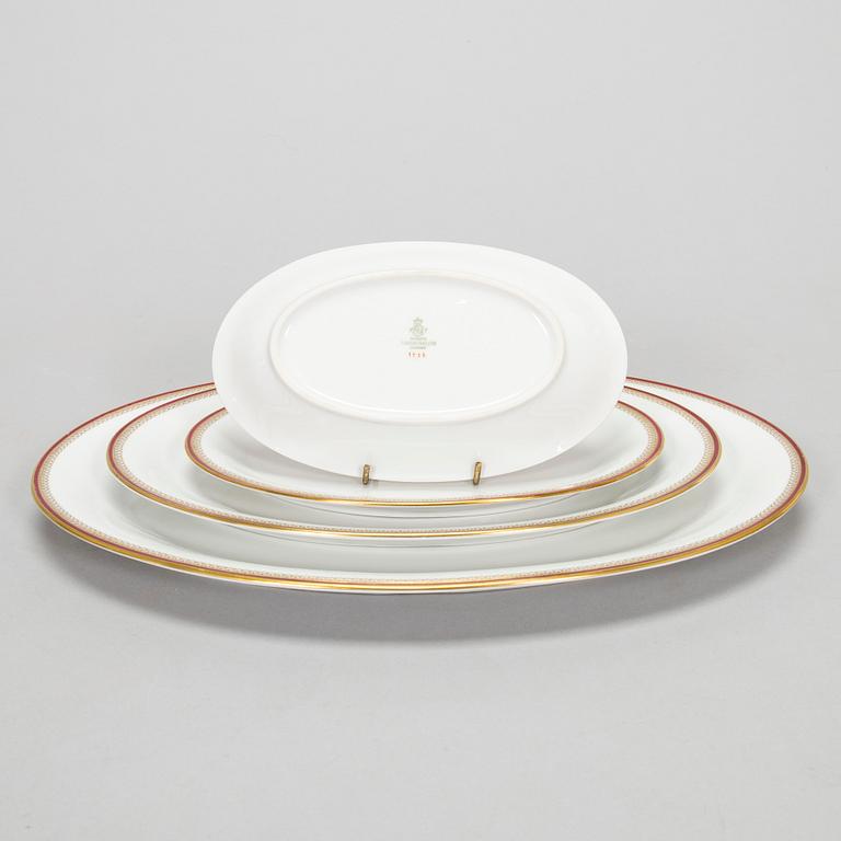 A 60-piece tableware set, Tirschenreuth Bavaria, Germany and nine mocha cups with saucers from Limoges, France, mid.