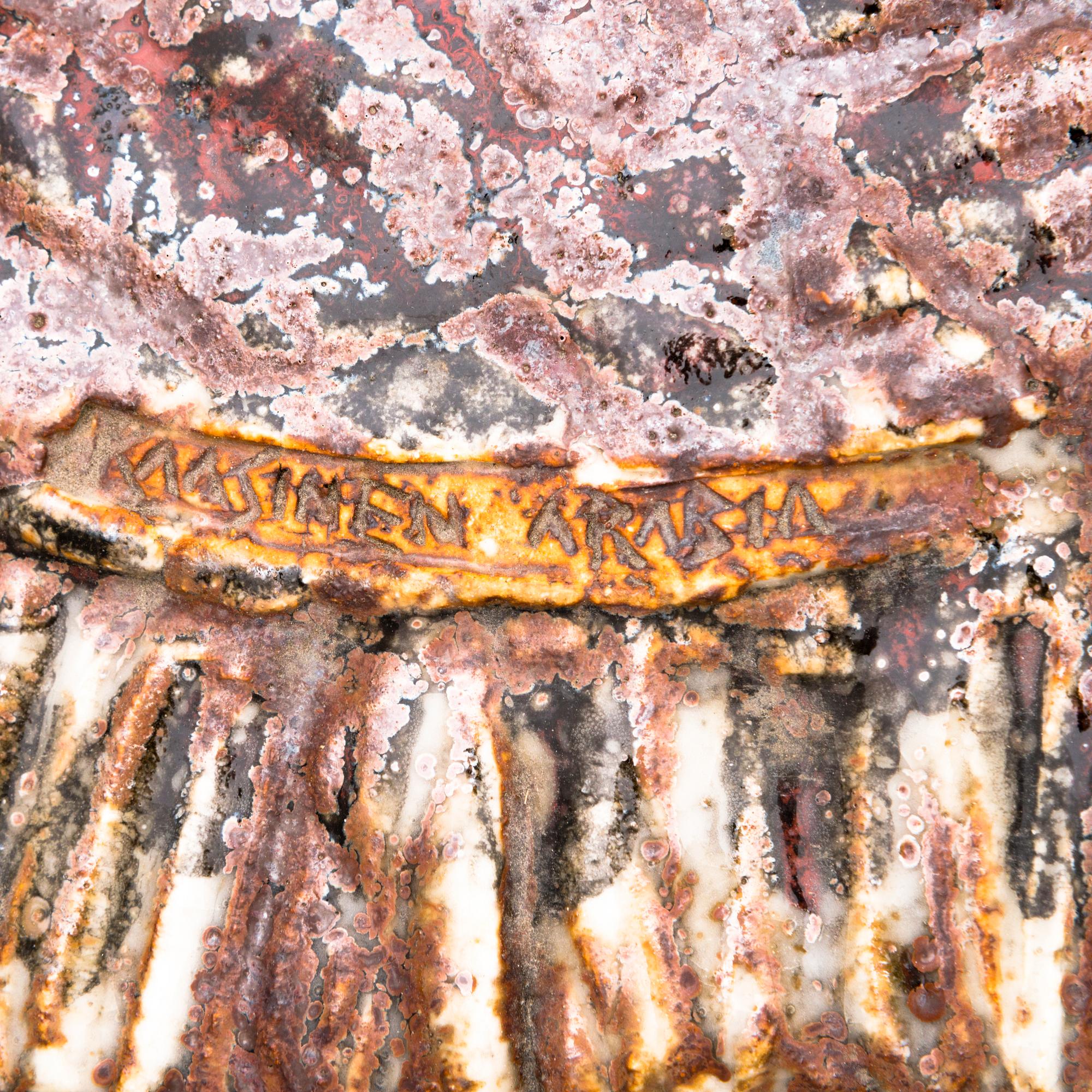 TAISTO KAASINEN, a relief signed Taisto Kaasinen Arabia.