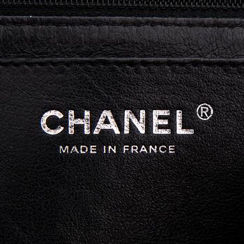 CHANEL Caviar Reissue 2.55 Jumbo Single Flap Bag.