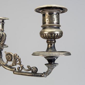 A pair of late 19th century silver plated kandelabras by Henry Wilkinson & Co Ltd, Sheffield, England.