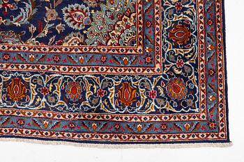 An oriental carpet, c. 390 x 295 cm.