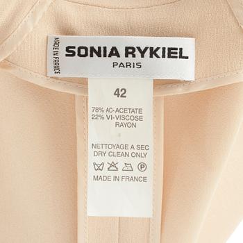 SONIA RYKIEL, a two-piece creme colored dress consisting of jacket and skirt.
