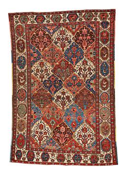 A RUG, an old Bachtiari, ca 213,5 x 142-147,5 cm.