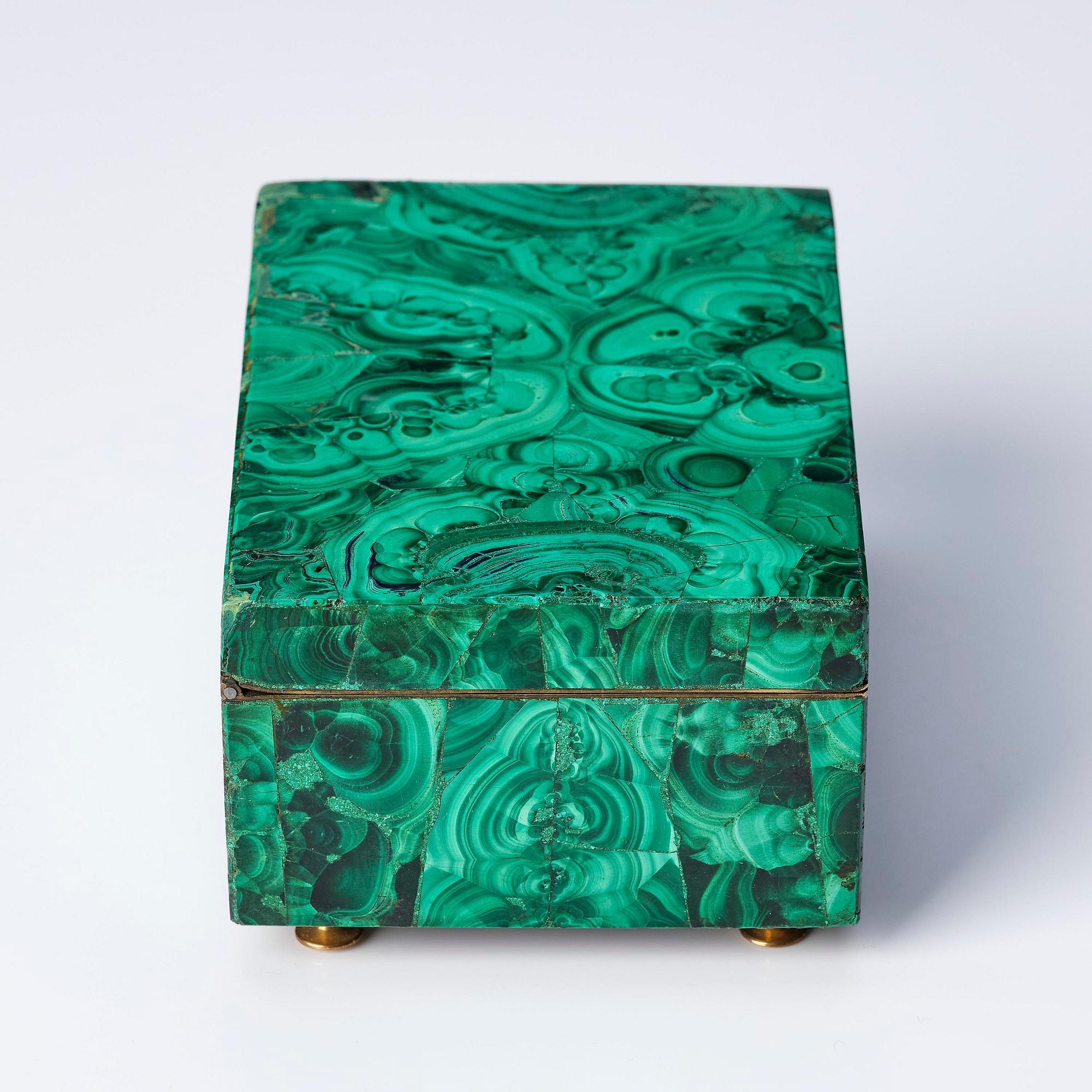 A Russian Nicholas II malachite-veneered box, circa 1900.