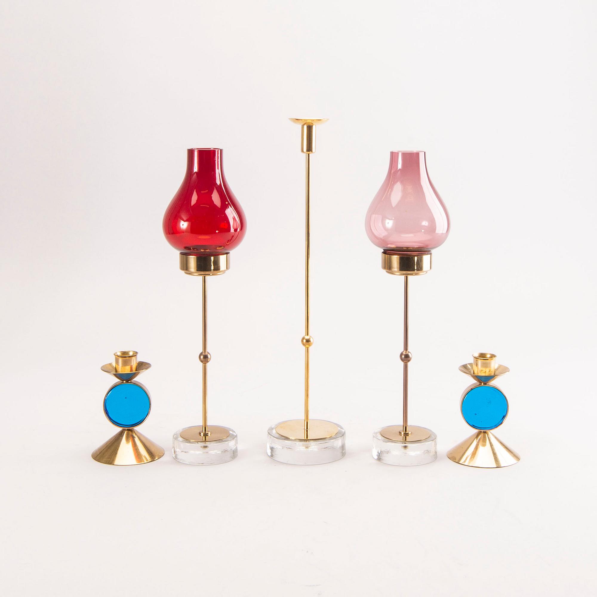 Gunnar Ander, a set of five different brass and glass candle sticks from Ystad Metall mid 1900s/second part.