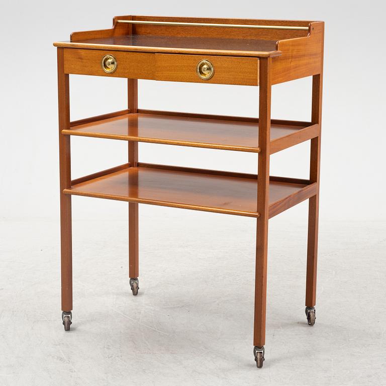 Josef Frank, a mahogany serving table/bar table, model 2227, Firma Svenskt Tenn, second half of the 20th century.