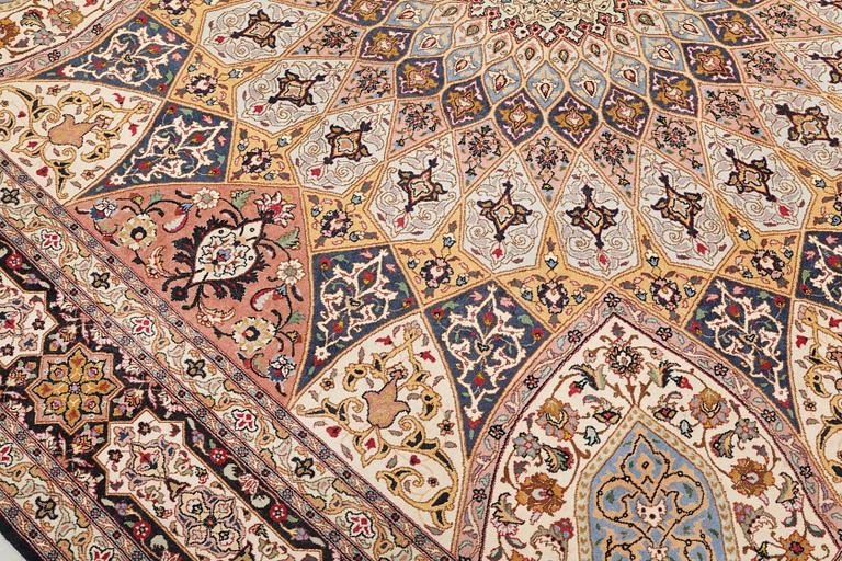 A part silk Tabriz carpet, so-called 50 Raj, approx. 266 x 248 cm.