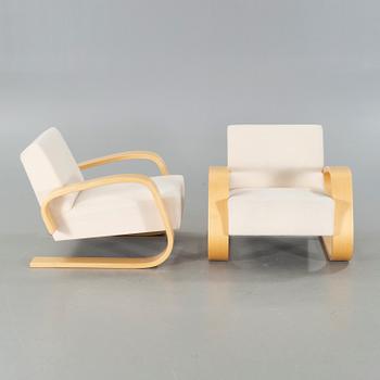 A pair of model 400 "Tank" chair designed by Alvar Aalto, Artek, 2004.