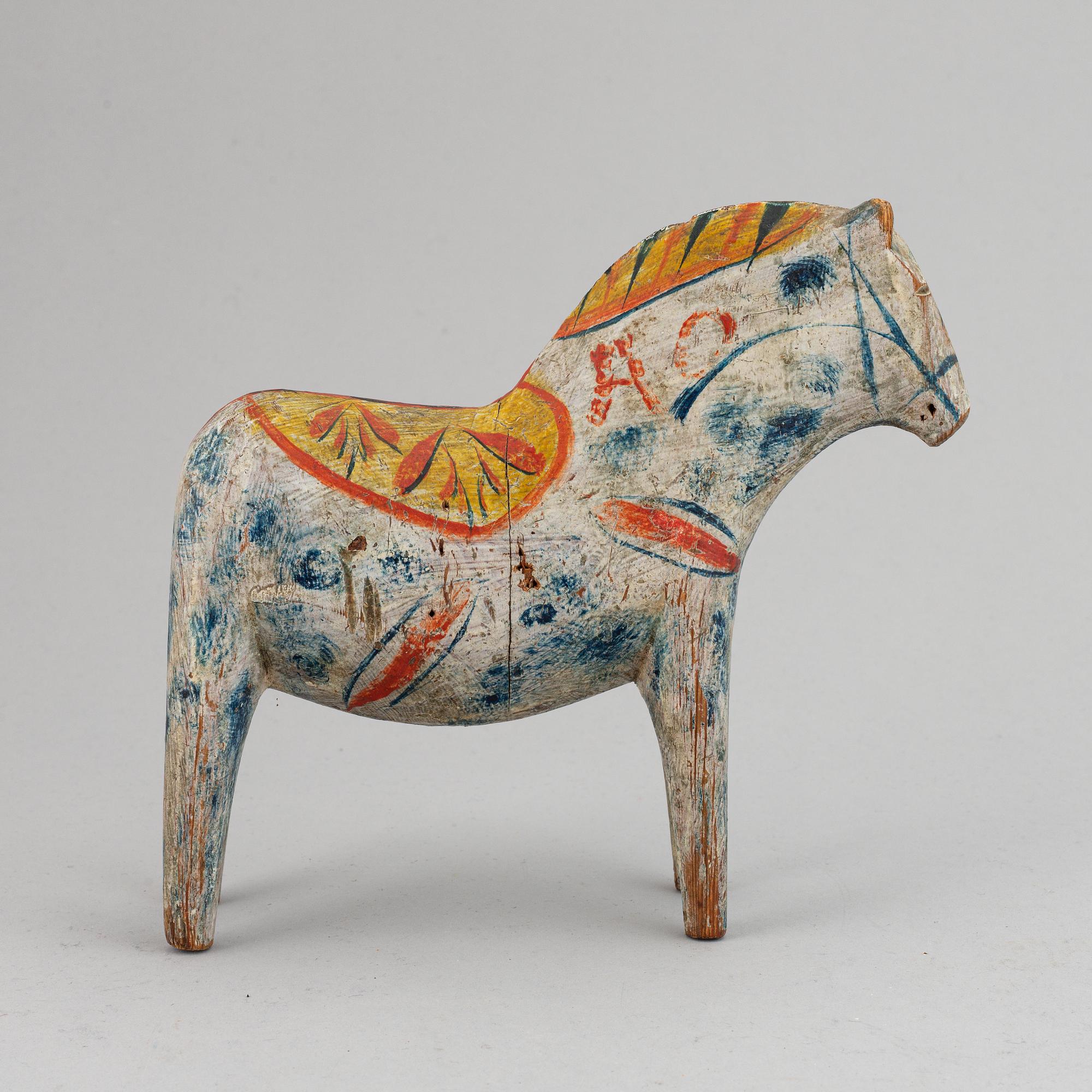 A wooden carved and painted 'Dalahäst', early 20th century.