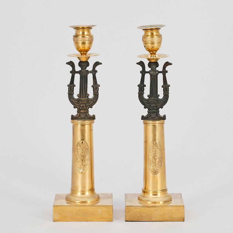 LJUSSTAKAR, ett par, brons, empire, 1800-talets första hälft.