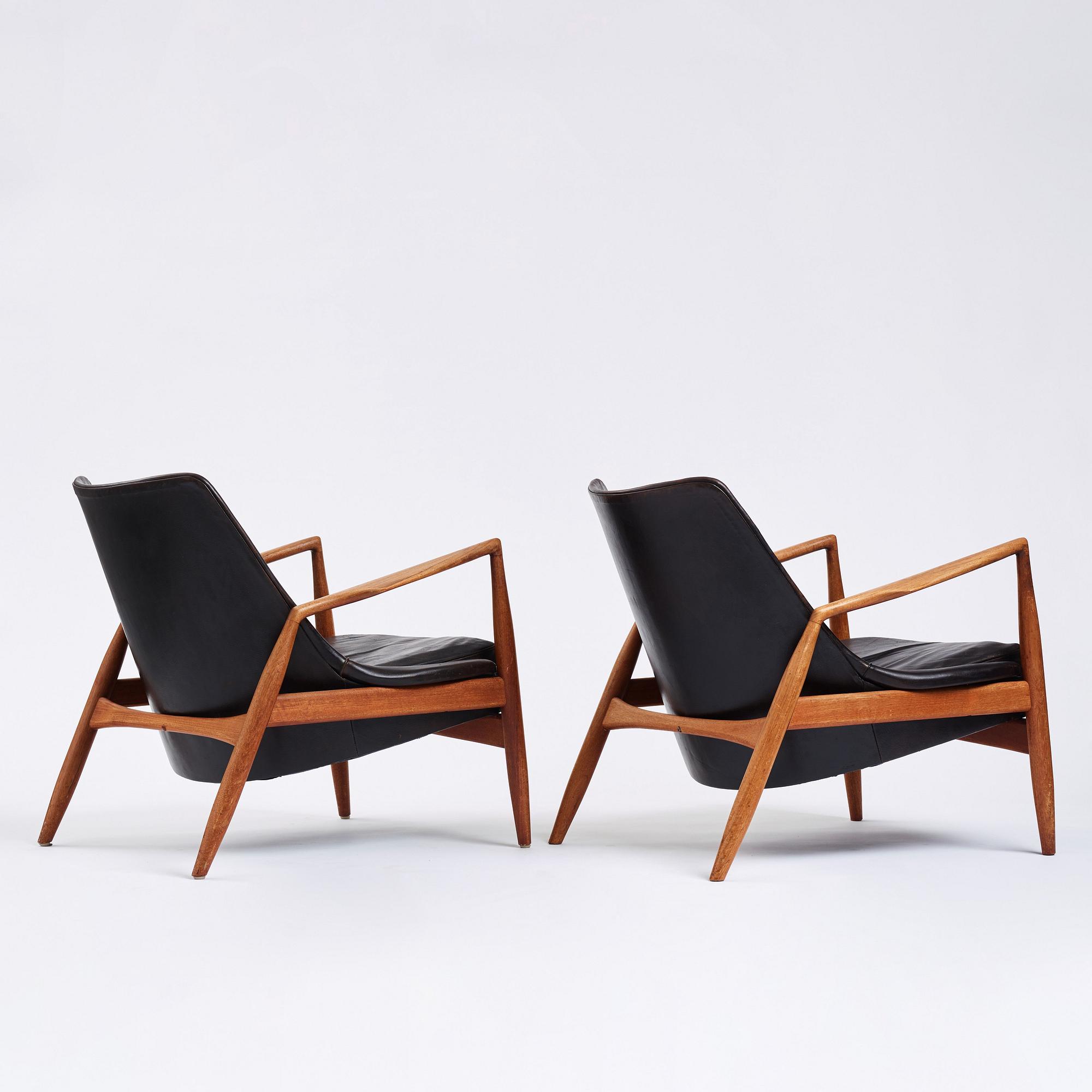 Ib Kofod-Larsen, a pair of black leather 'Sälen' easy chairs, Olof Perssons Fåtöljindustri (OPE), Sweden 1950s-60s.
