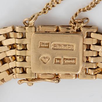 Armband med berlocker guld 18K guld.