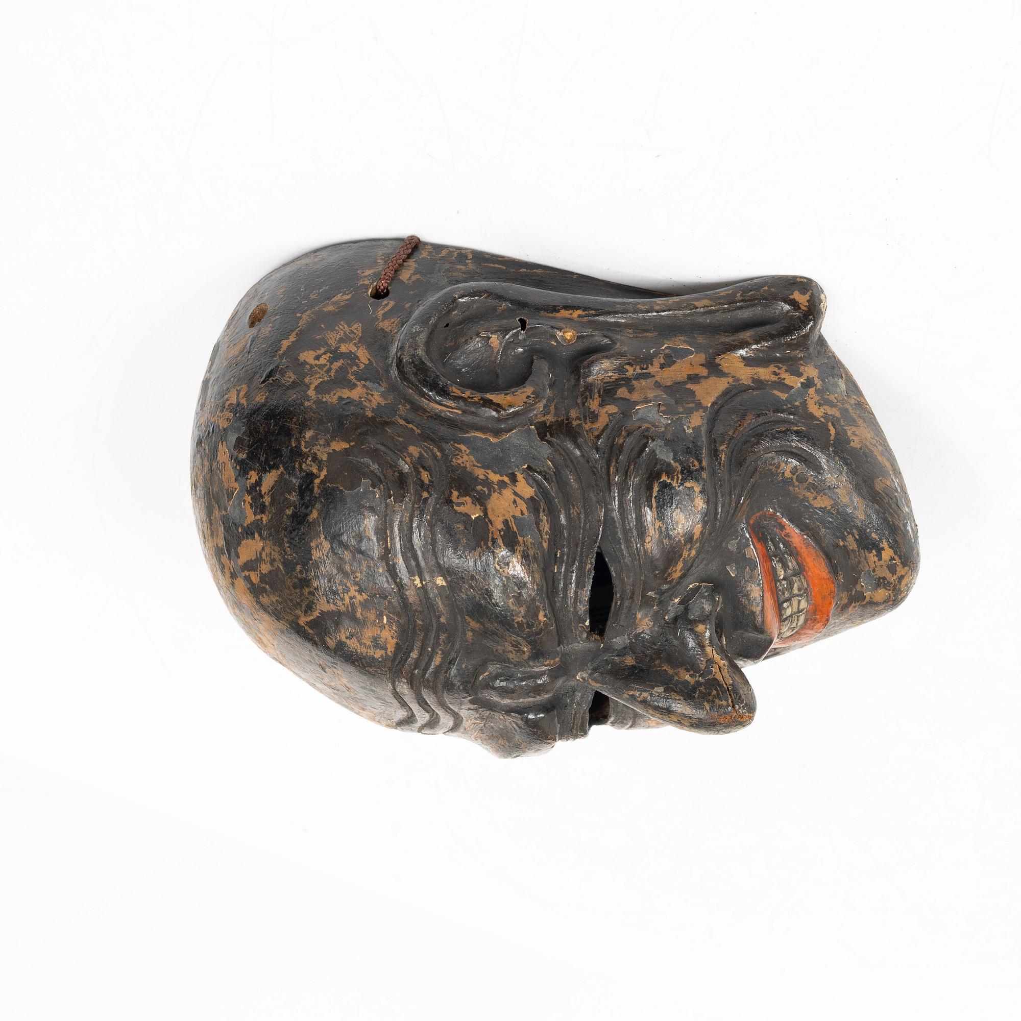 A Japanese painted and laquered noh mask, 'Gigaku', 1900s.