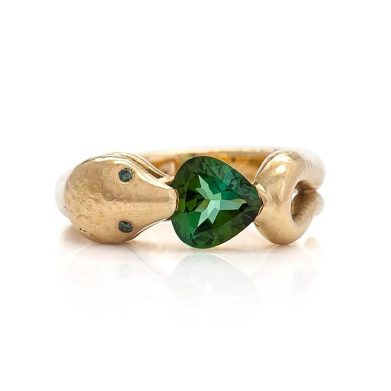 Torbjörn Tillander, an 18K gold serpent ring with heart-shaped green tourmaline and green diamonds, Helsinki 2011.
