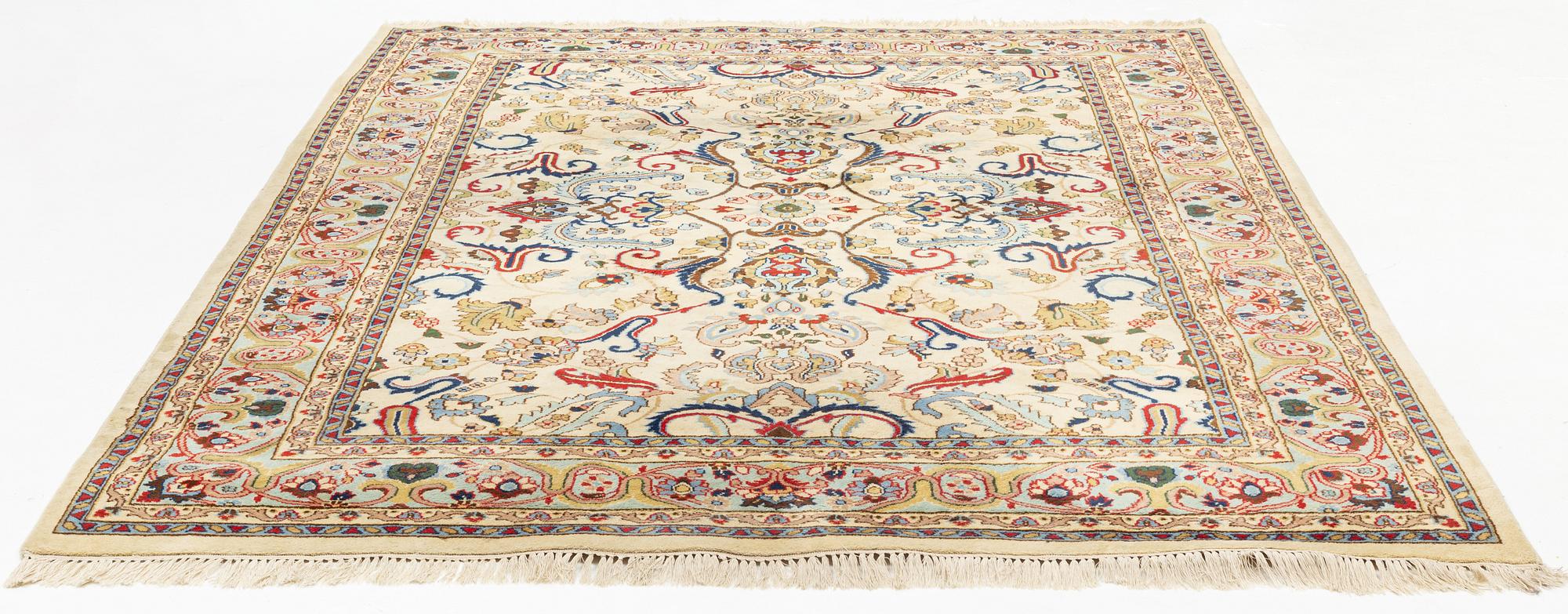 A carpet, signed, circa 286 x 212 cm.