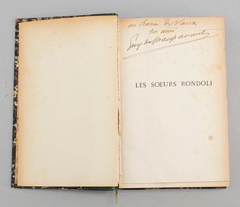 BOOK, inscribed by Maupassant.