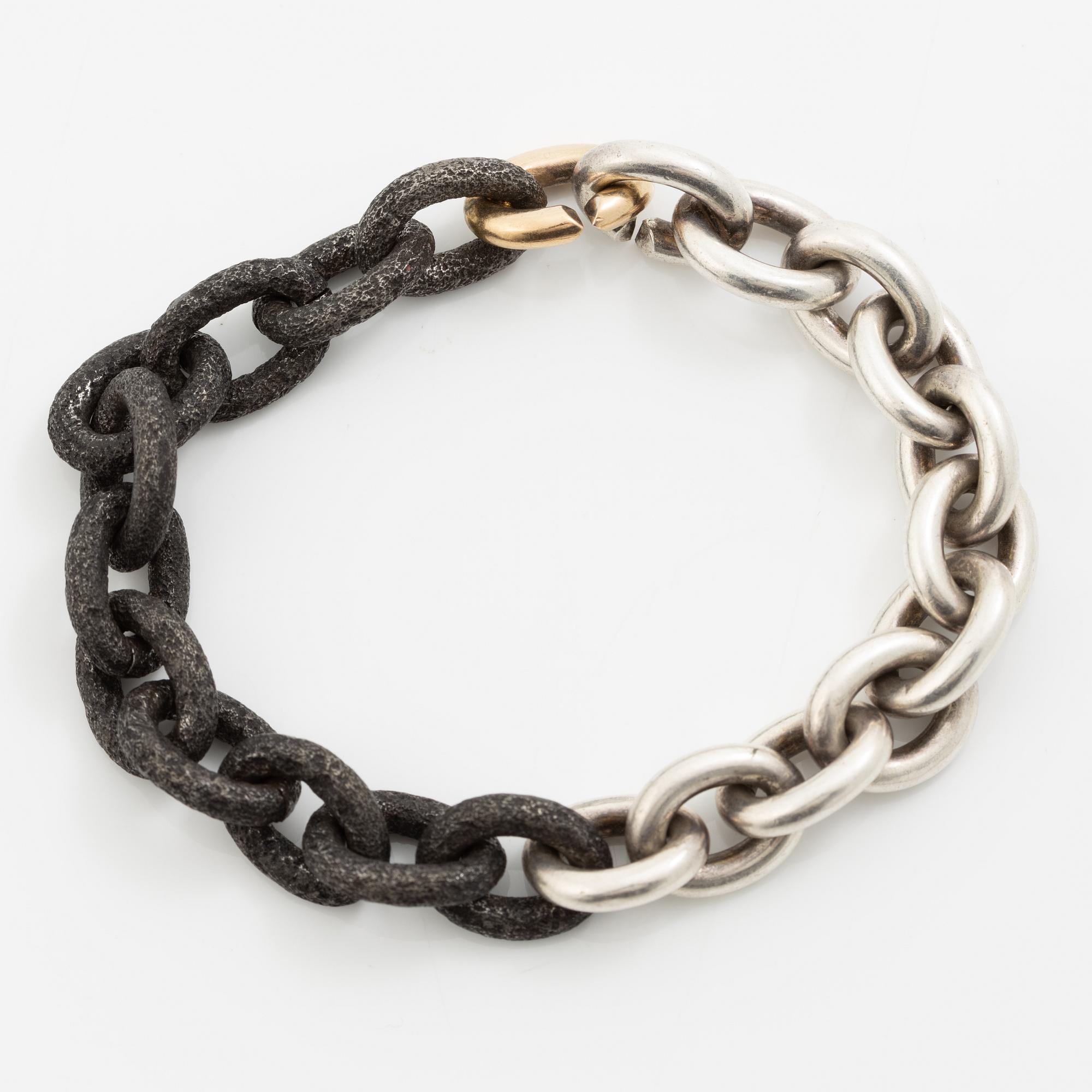 Mikael Hamma, a bracelet 18K gold, sterling silver and oxidised iron, Stockholm 1996.