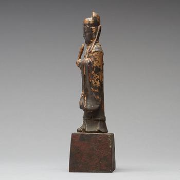 A copper alloy figure of a daoist dignitary, late Ming dynasty (1368-1644).