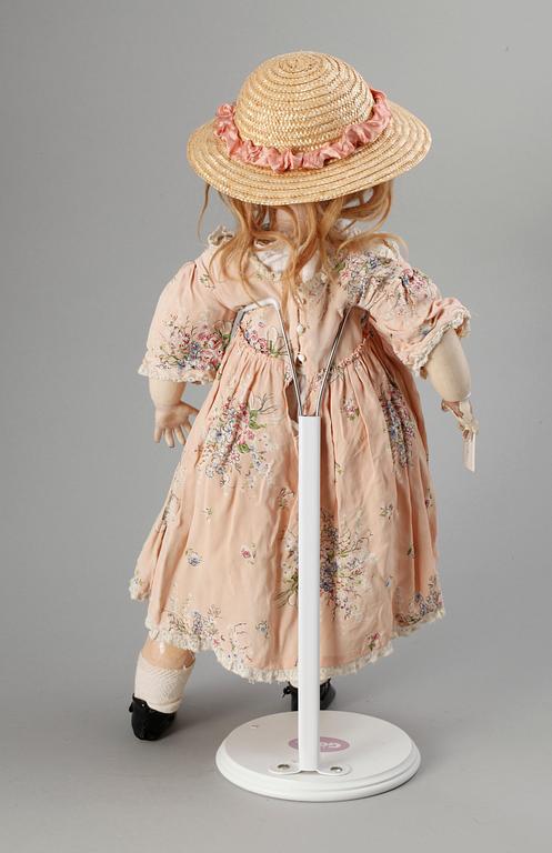 A German/French bisquit doll, around 1900. Marked DEP.