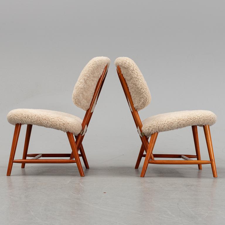 A 1950's pair of 'TeVe' easy chairs by Alf Svensson.