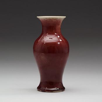 A sang de boef glazed vase, Qing dynasty, 19th Century.