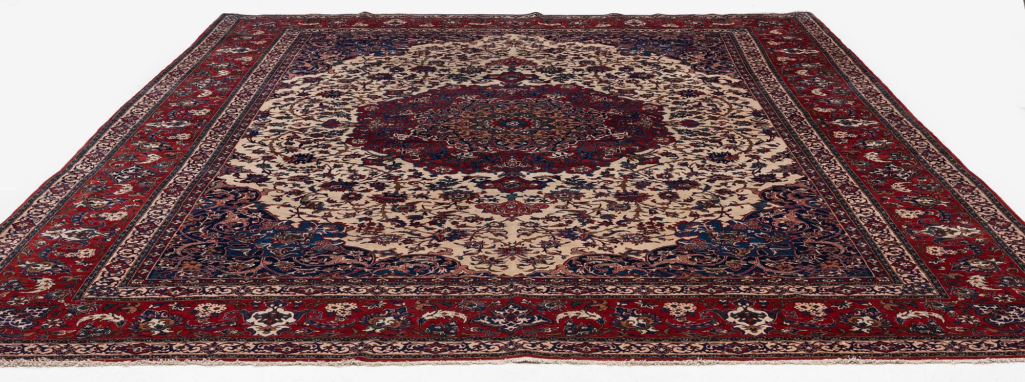 A semi-antique Isfahan carpet, Central Iran, c. 432 x 319 cm.