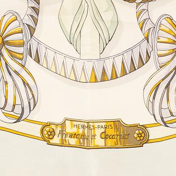 Hermès, a 'Frontaux et Cocardes' silk scarf.