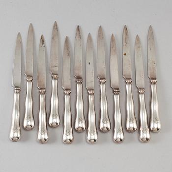 A set of twelve silver chees-/fruit knifes, mark of Adolf Landoff & Son, Gothenberg 1953.