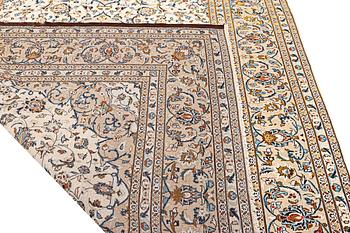 A Kashan carpet, c. 340 x 242 cm.