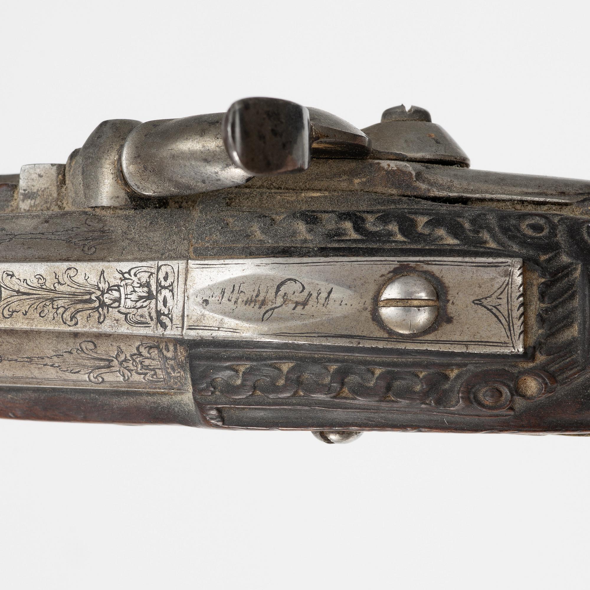 A pair of percussion pistols, converted from flintlock. 18th century.
