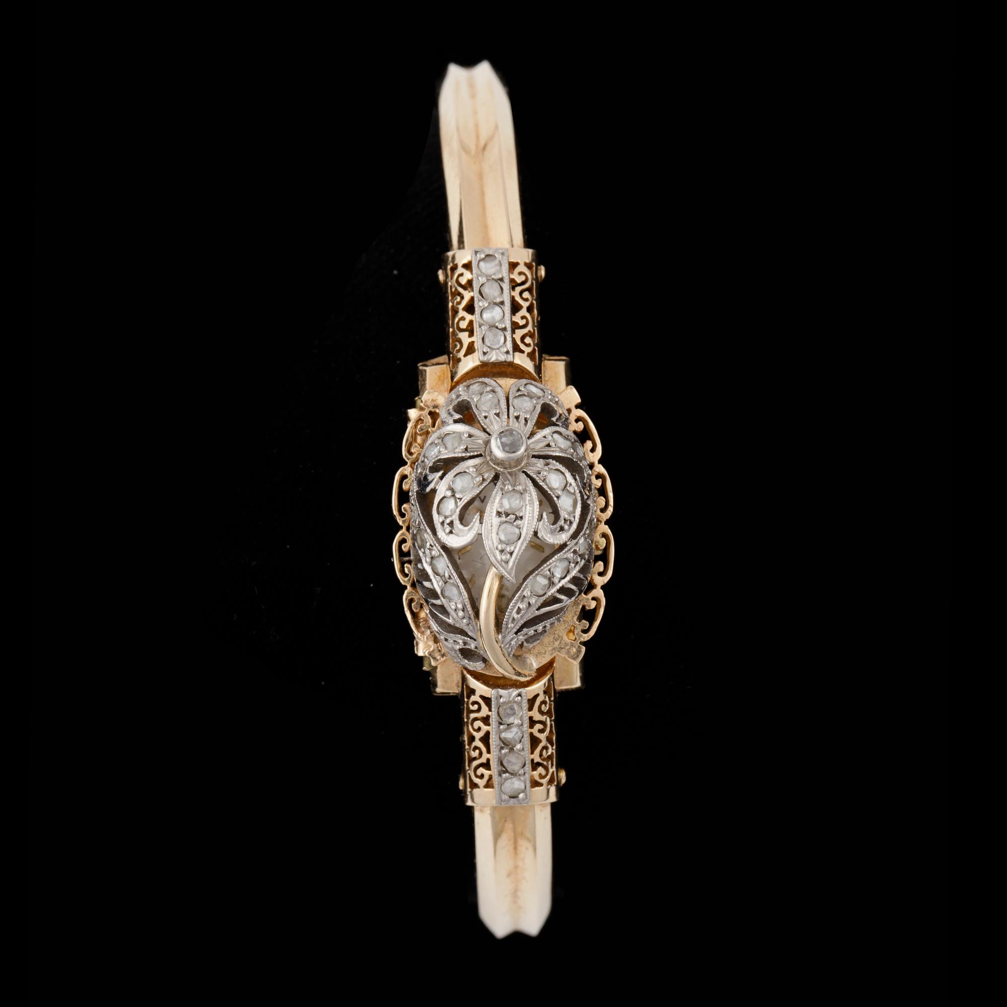 ARMBANDSUR, dam, 18k guld med rosenstenar, Vasa, 1960-tal. Vikt 23,4g.