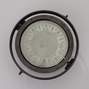 A Swedish compass by G.W. Lyth in Stockholm, and a bottle ship.