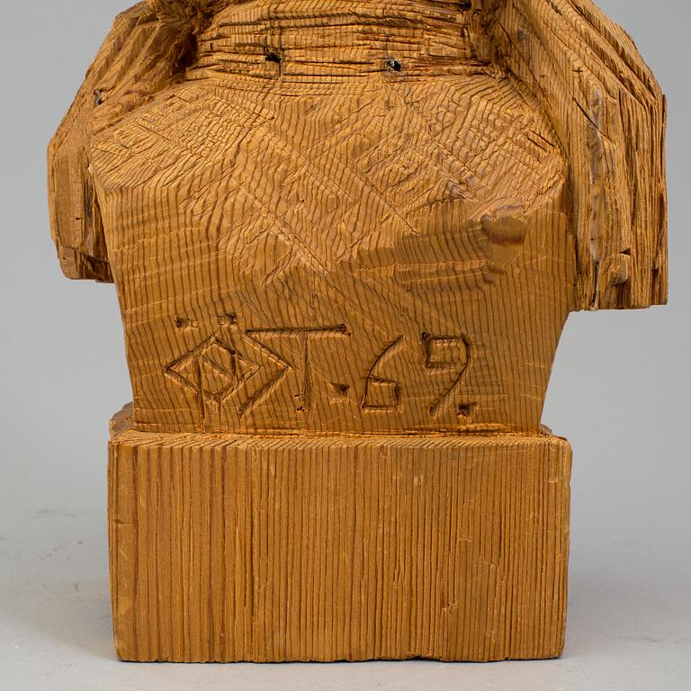 A signed wooden Per Nilsson Öst sculpture dated 69.