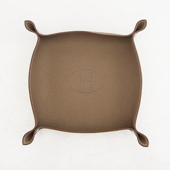 Hermès,  a leather  Mises et Relances tray 2021.