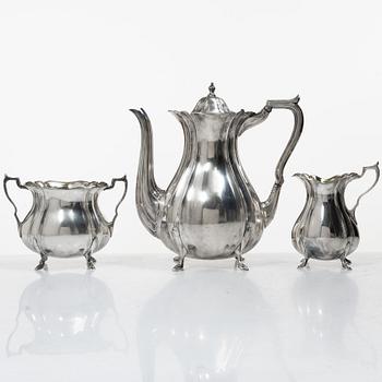 Guldsmedsaktiebolaget (GAB), A Swedish Rococo style silver coffee pot, cream jug and sugar bowl, mark of GAB, Stockholm 1918-1919.