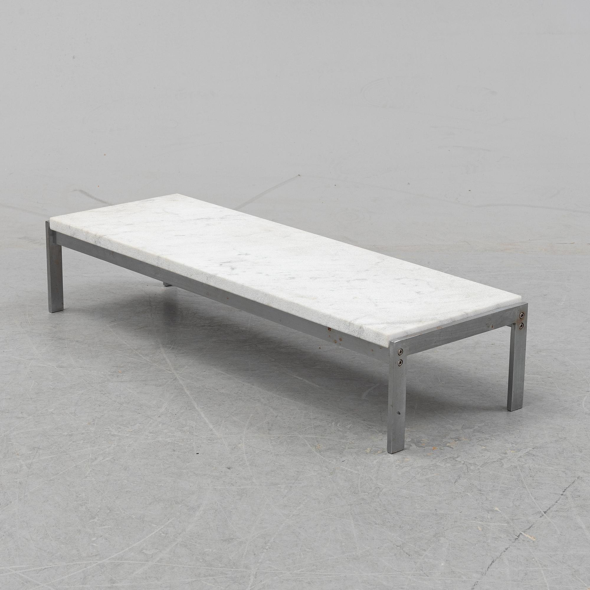 Poul Kjaerholm, a marble top 'PK 61' table, Fritz Hansen, Denmark, 1989.