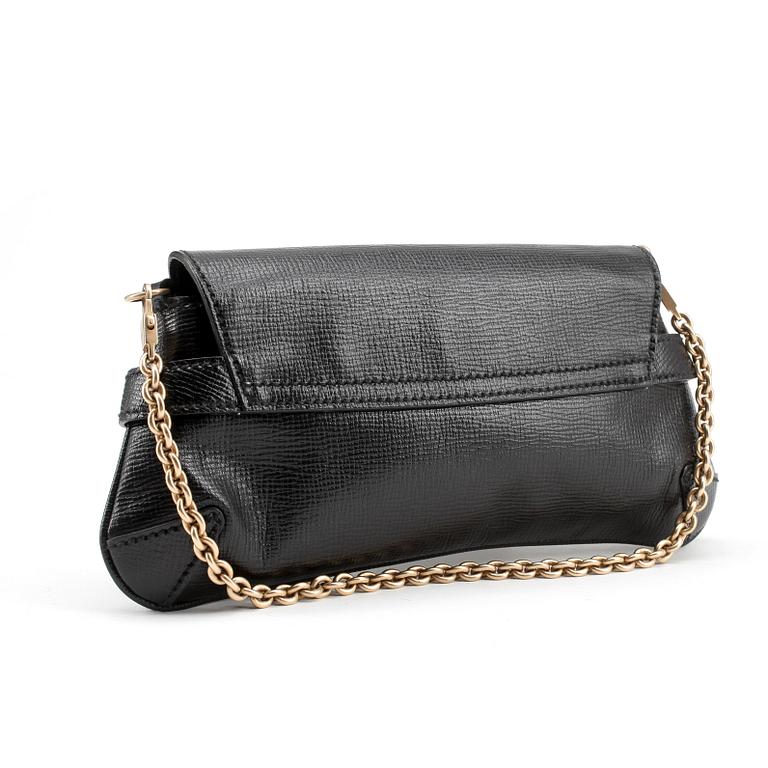 GUCCI, a black embossed leather clutch with a shoulder strap.
