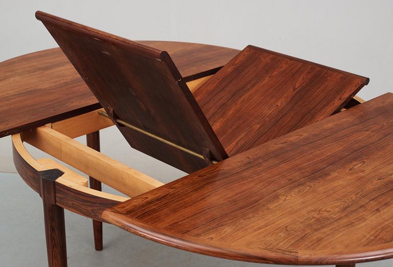 A Niels Ole Møller palisander dining table and nine chairs, J.L. Møller, Denmark 1950's-60's.
