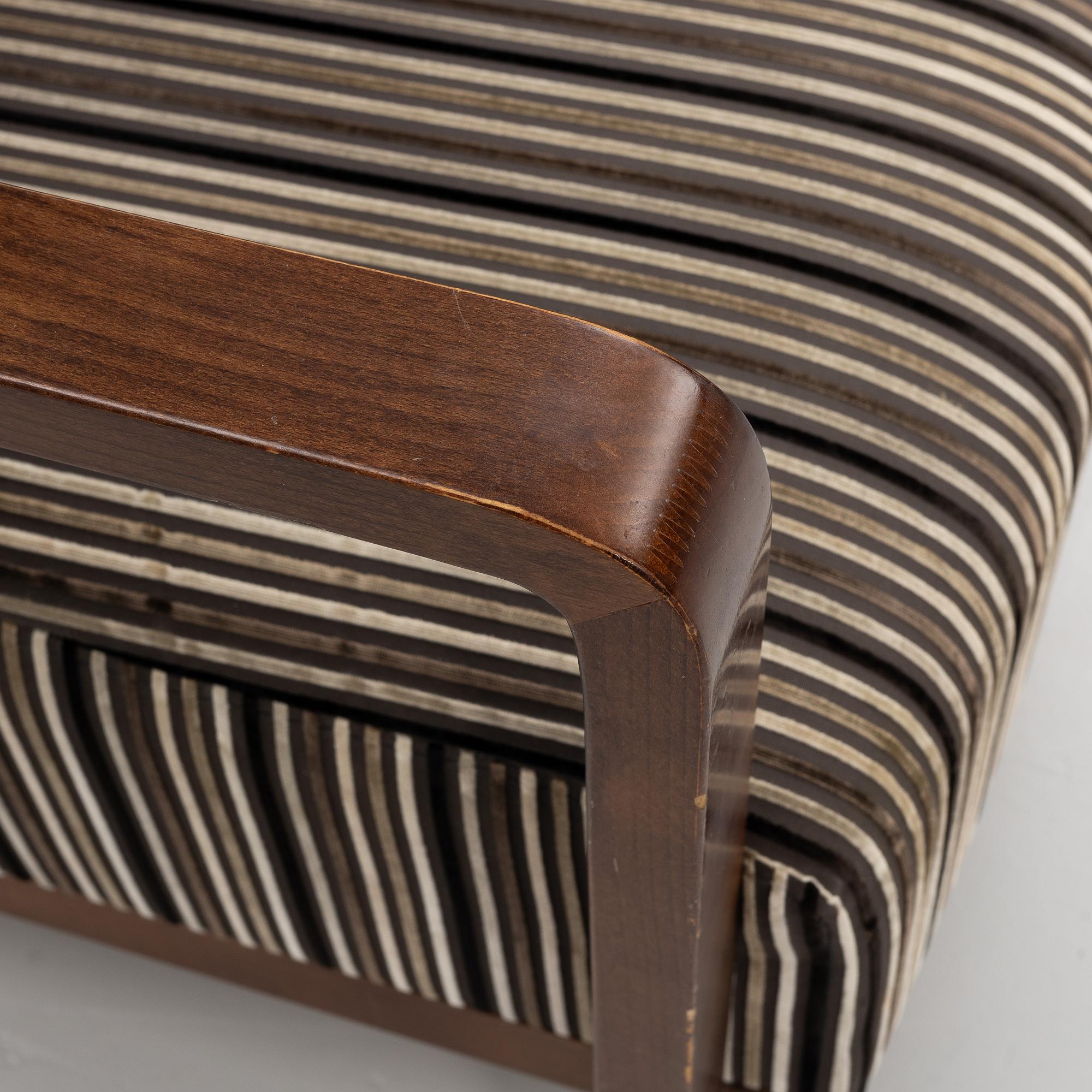 A pair of armchairs, Andreu World, Spain, 21st Century.