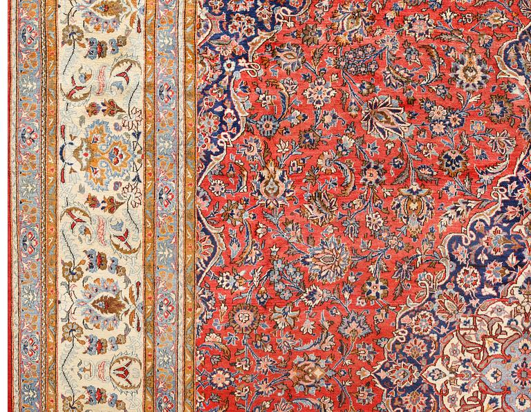 A semi-antique Keshan, central Iran, signed, c 437 x 320 cm.